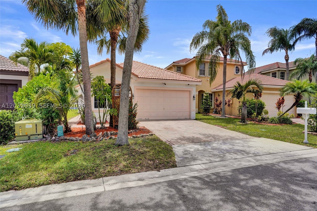 Photo of 5272 NW 117th Ave, Coral Springs, FL 33076 (MLS # A12032039)
