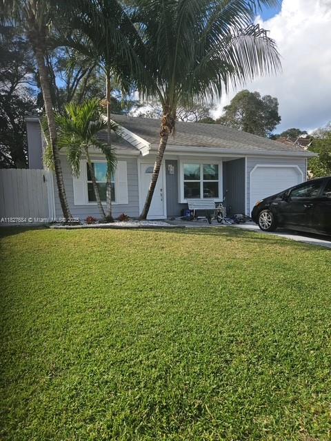 Beautiful one-story 2/2 single-family home with 1 car garage and spacious private backyard, perfect for entertaining! This home features vaulted ceilings, an upgraded kitchen with marble countertops and modernized bathrooms. In additional to original layout, a permitted additional room was added in 2016 with a window, offering great flexibility for use as an office, guest room, or playroom. Garage has also been partially converted to a room but can be easily return to full garage use if desired.