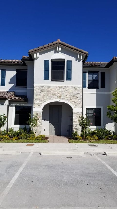 Photo of 11313 SW 250th Ter #11313, Homestead, FL 33032 (MLS # A12017235)