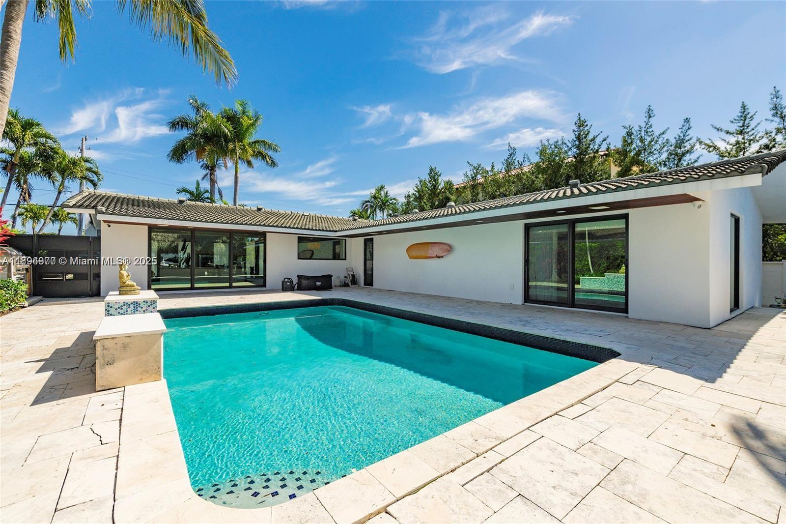 Rent this luxurious waterfront home in the gated community of San Souci Estates, fully renovated single-family home. Spanning 2,700 sqft, this modern-designed residence offers 4 spacious bedrooms and 3 stylish bathrooms, perfect for families or entertaining guests. Enjoy 75 feet of deepwater frontage, providing easy access for boating and water activities. The property is equipped with a 15,000 lb boat lift, making it ideal for boaters. This turnkey waterfront home combines contemporary elegance with practical amenities, offering an exceptional lifestyle on the water.