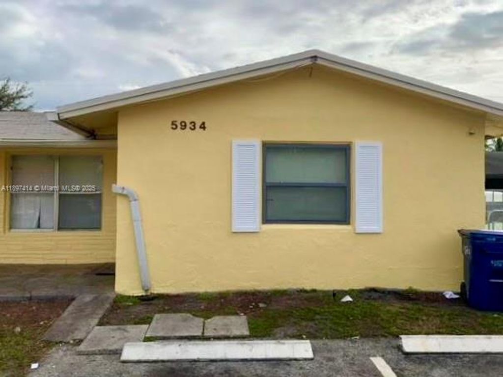 Photo of 5934 NW 20th St #5934, Lauderhill, FL 33313 (MLS # A11897414)