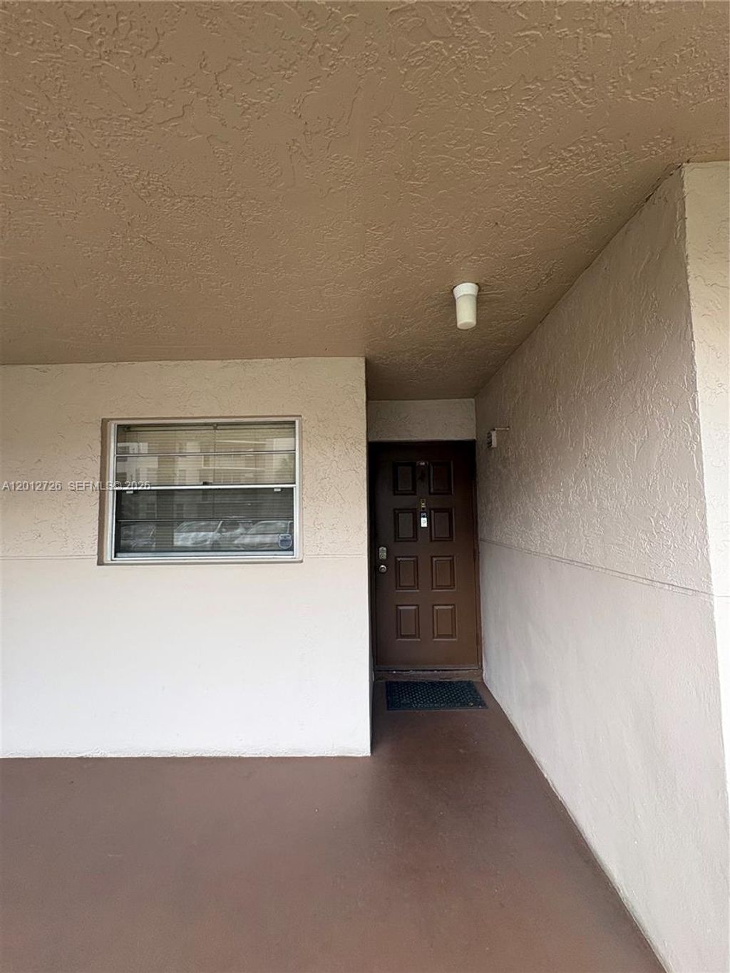 Photo of 9531 Seagrape Dr #106, Davie, FL 33324 (MLS # A12012726)