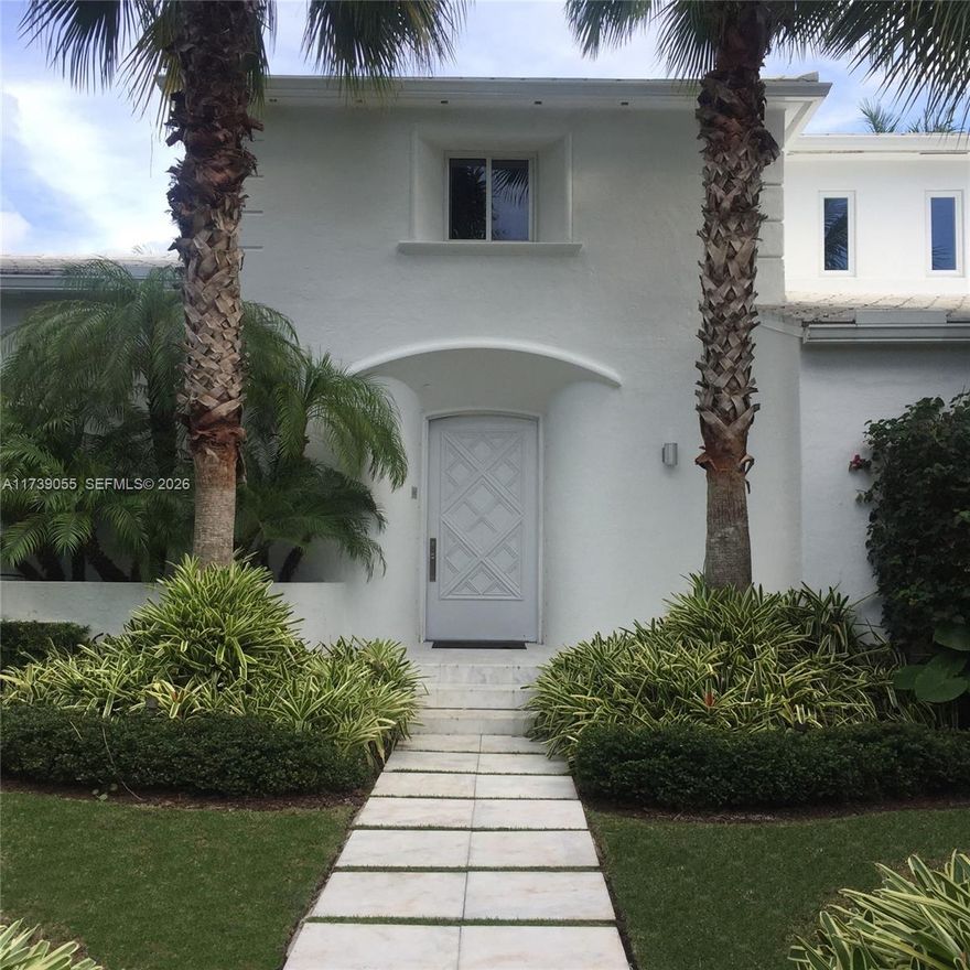 Walled compound on 17,100 SF double lot. Vibrant & sophisticated this home offers the true luxury of privacy and tranquility. With warm & welcoming Brazilian design elements, you will relax into its quiet luxury. Double-height cathedral ceilings in living room. Truly huge kitchen with Sub-Zero and Miele appliances. The covered outdoor terrace & grill is everyone's favorite hangout space. Impressive, natural wood office. Sunken theater/media room with blackout shades. Four separate outdoor terraces surrounded by lush gardens. Where better to enjoy sunny days & starlit nights? Freestanding 2-bedroom guest house & oversized pool. Motor court & 2-car garage, full house generator, Savant Smart Home, Lutron lighting & more. All homes have their moment, but this one will stand the test of time!