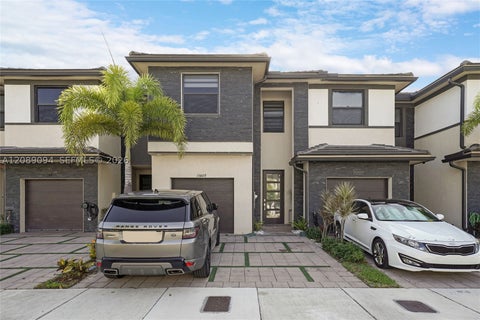 Photo of 15809 NW 91st Ct, Miami Lakes, FL 33018 (MLS # A12089094)