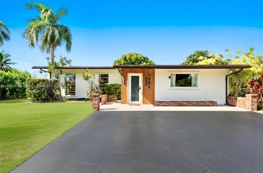 Fully renovated 4-bedroom / 2.5-bath waterfront home in Margate with a beautiful sun deck overlooking the lake, perfect for relaxing and entertaining. Bright, open-concept living with designated dining and family areas that flow to the water. Modern kitchen, modern island,  and stainless-steel appliances. Spacious Primary Suite, walk-in closet, double vanity bath, and a stylish outdoor shower that adds a resort-like, relaxing touch. Secondary bedrooms are well-sized. Separate laundry room and extra storage. Oversized backyard offers ample space for gatherings and sunset views. Convenient location close to shopping, dining, parks, schools, and major highways. Move-in ready—come enjoy waterfront living!