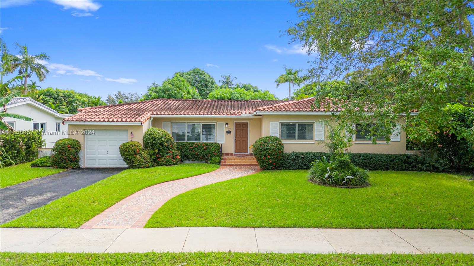 Lovingly maintained 3 bedrooms 2 bath + 1 car garage home in South Miami. East of US1 and 11,000+ sq foot lot! Renovate existing home or build a new one. Great floor plan with spacious rooms, wood floors in pristine condition, formal living room, dining room, kitchen, utility/laundry room and a Florida room over looking the very tropical back yard with fruit trees. Quiet no thru street. Blocks from downtown South Miami, Whole Foods, University Of Miami and more! The possibilities are endless. Flood zone X.