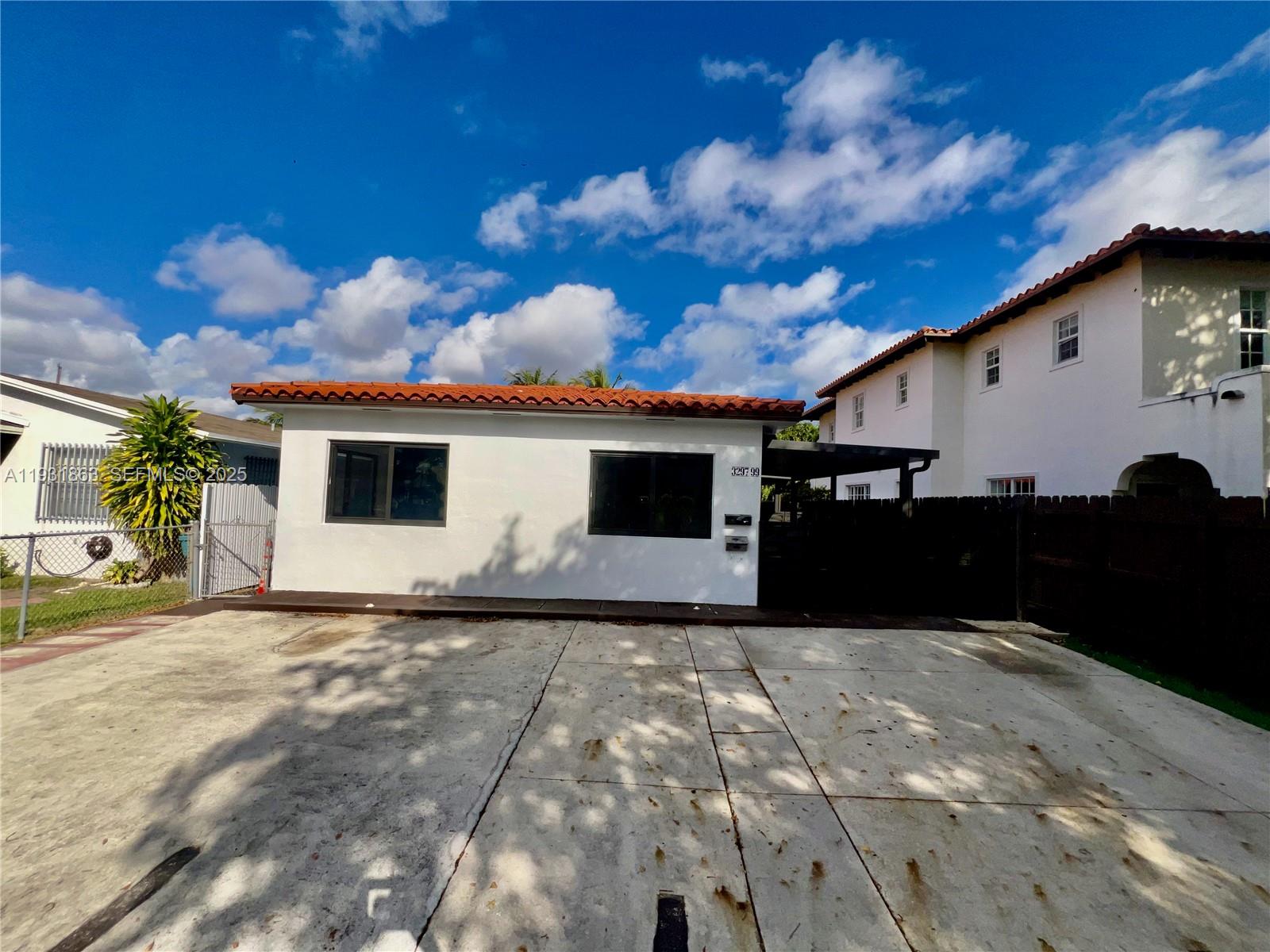 3297 - 3299 SW 26th St