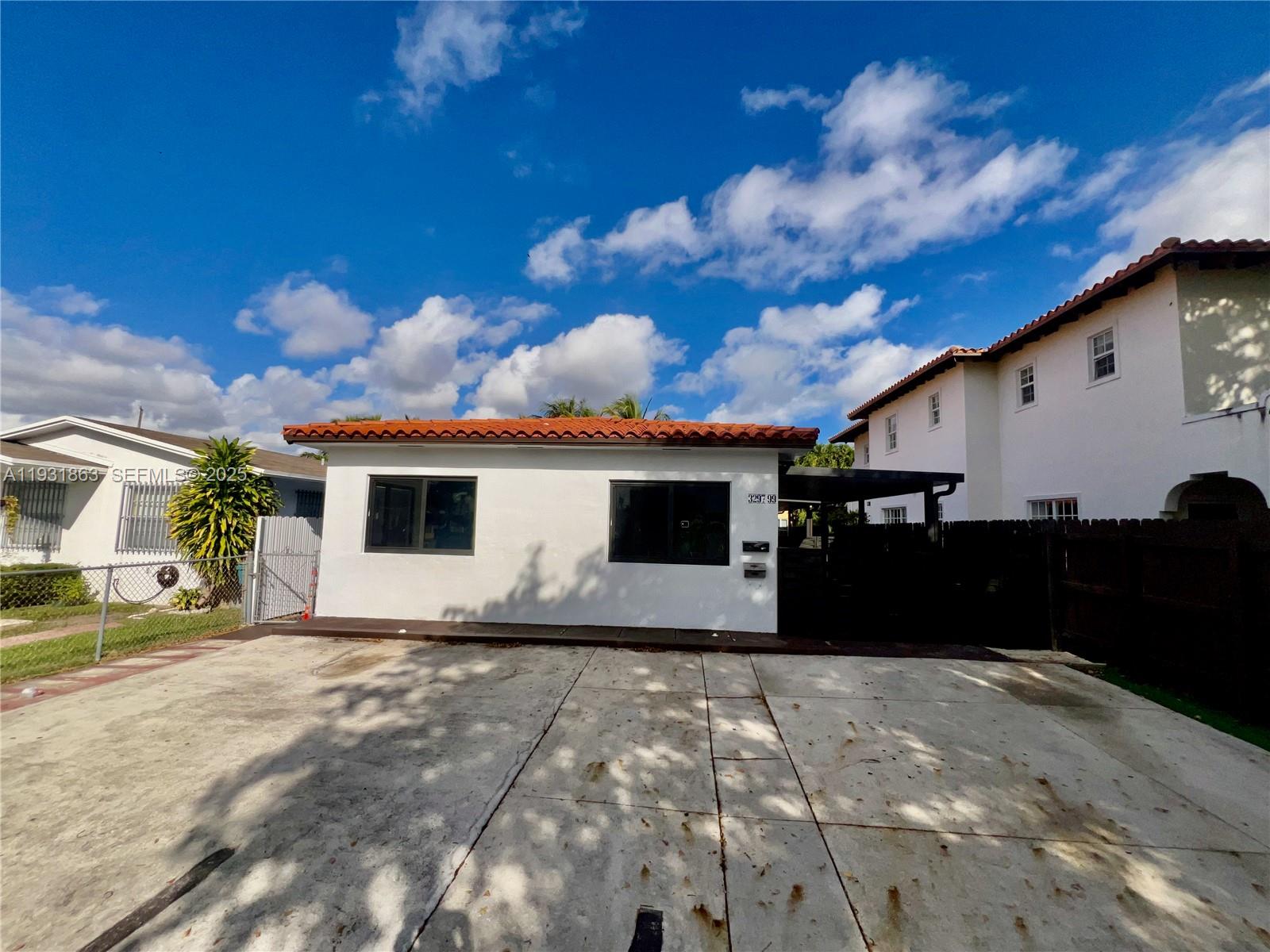 3297 - 3299 SW 26th St