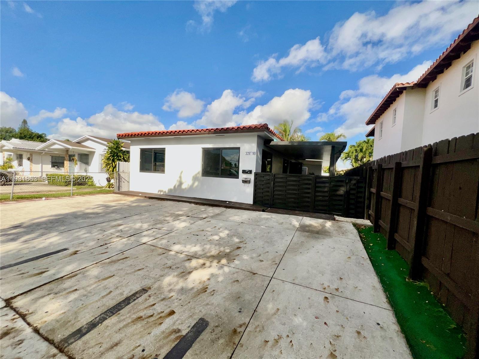 3297 - 3299 SW 26th St