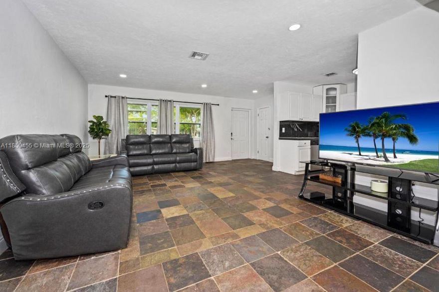 Beautifully renovated private paradise. Spacious 3 bedroom, 2 bath home on over 10,000 square feet of private lot for rent.  Home is ready to move in, but can be shown sooner. Large open kitchen/living room and light-filled Florida room that overlooks a peaceful fenced-in backyard. Your private oasis awaits! New roof, A/C 2023, large laundry room. Close to Wilton Manors. Don't miss this one to enjoy for years to come.