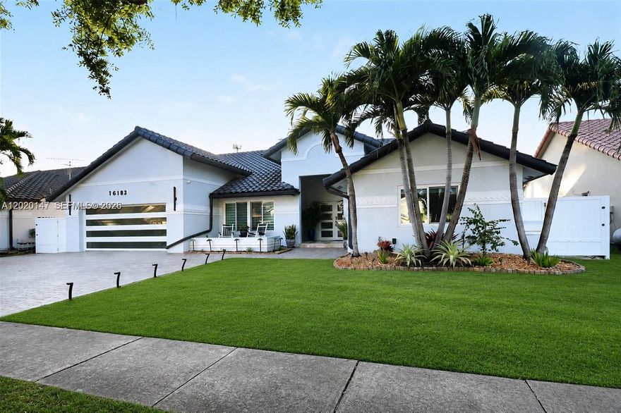 Spacious and impeccably maintained, this stunning 4-bedroom, 3-bathroom residence is located in the highly sought-after Spring Valley community of Pembroke Pines. Offering more than 3,160 square feet of living space, the home features soaring ceilings, impact windows, abundant natural light, and an open, functional layout ideal for both everyday living and entertaining.

The upgraded kitchen is designed with wood cabinetry, granite countertops, and generous storage space. Elegant interior finishes include 36x36 porcelain tile flooring throughout, crown molding, and ceiling fans throughout the home.
Step outside to your private backyard oasis featuring a resort-style oversized heated pool complete with waterfalls and updated lighting—perfect for relaxing or hosting guests. Backing directly to a park, the property enjoys exceptional privacy with no rear neighbors.

Additional highlights include remodeled bathrooms, custom-made walk-in and wall-to-wall closets, a converted additional room/office, generator connection with gas tank, newly installed two-car garage doors, and a spacious lot within a well-established neighborhood with low POA fees.

Conveniently located near parks, shopping, dining, and top-rated schools, this exceptional home offers the perfect blend of comfort, style, and functionality.