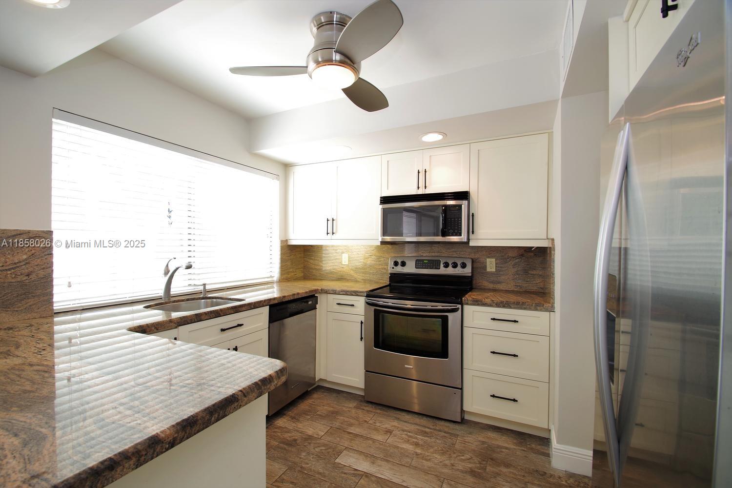 Beautifull Spacious 3BED/2.5 Bath all updated with custom granite kitchen, wood porcelain tile floor downstairs and hardwood bamboo and Brazilian walnut floor upstairs. Washer and dryer, private front and backyard. All bathrooms redone. New painting. Very nice association with 3 pools, Basketball court, Large Field camp, dog park, large shaded playground. 24 hour on site police. Best place to call HOME. Walking distance to houses of worship.