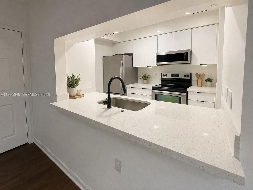 Photo of 12124 Saint Andrews Pl #305, Miramar, FL 33025 (MLS # A11995646)