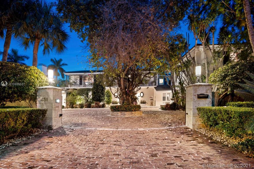 Nestled in the exclusive gated community of Bay Point, this stunning lakefront estate offers some of the most spectacular views right from the backyard. Stylishly renovated with modern touches keeping its original charm, this is the perfect place to call home. Boasting a split floor plan, spacious master suite with double height ceilings and a sitting room with fireplace, gym, private upstairs office with a full bath & library. An entertainers paradise with a large formal dining room & expansive living area with full bar. Enjoy the privacy and serenity as you enter the property with lush landscaping and mature trees throughout. The neighborhood of Bay Point is in the heart of Miami with easy access to nearby Midtown, The Design District, Wynwood, and Biscayne Blvd.