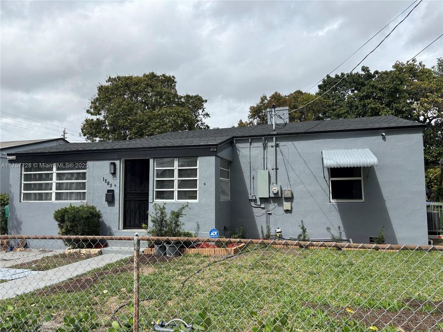 LOCATION! LOCATION! WELCOME TO OFF 45 STREET BEAUTY: MINUTES FROM THE ECLECTIC WYNWOOD AREA, MIAMI DESIGN DISTRICT AND MIAMI INTERNATIOANL AIRPORT.THIS HOUSE BOAST 3 BEDROOMS 2 BATHS, FAIRLY NEW KITCHEN, FRESHLY PAINTED INSIDE AND OUT, MANICURED LAWN WITH NEWLY PLANTED EDGINGS, CONCRETE SLABS, SHADED WITH FULL GROWN MANGO TREES  HANGING FROM THE NEIGHBORS... YOU CAN ENJOY SOME FRUITS WHEN IN SEASON AT THIS FULLY FENCED TRANQUILL BACKYARD. SITTING ON A 5000 SQ FEET DUPLEX ZONED LOT... PLENTY OF ROOM TO ADD ANOTHER STRUCTURE. COME AND FALL IN LOVE.