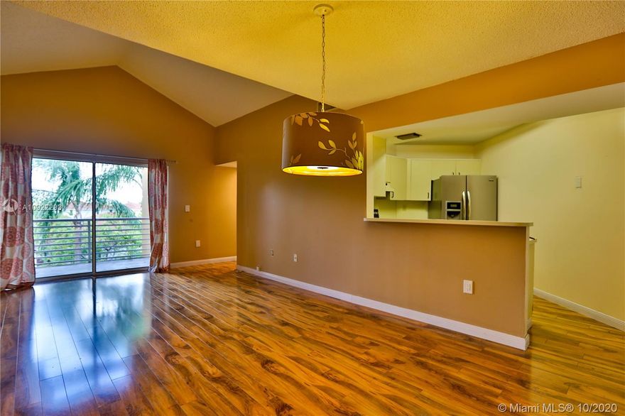 Opportunity to buy this spacious two bedroom two bathroom condo on the top floor of Soleil in Fountainebleu. 1 assigned parking and plenty of guest spaces available. Located in gated, secure community which offers gym, clubhouse, tennis, racquetball courts, and resort like pool. Unit has wood floors throughout; large open kitchen and washer/dryer in the unit. Includes walk-in closet and a large balcony. Centrally located, near FIU, Shopping Centers, Dolphin Expressway & Turnpike. Ready to move in and easy to show.