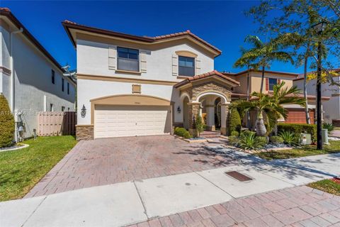 Photo of 10043 NW 89 Terra Ter, Doral, FL 33178 (MLS # A11972354)