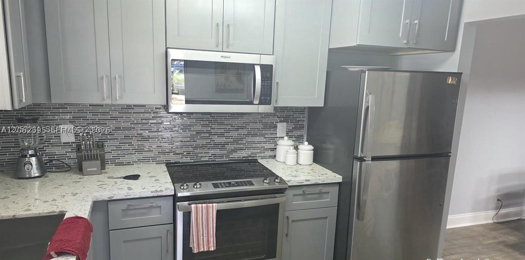 Photo of 524 Osprey Dr #10B, Delray Beach, FL 33444 (MLS # A12062595)