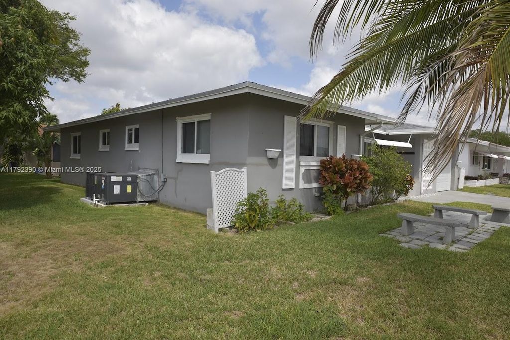 Photo of 4701 NW 43rd Ave, Tamarac, FL 33319 (MLS # A11792390)