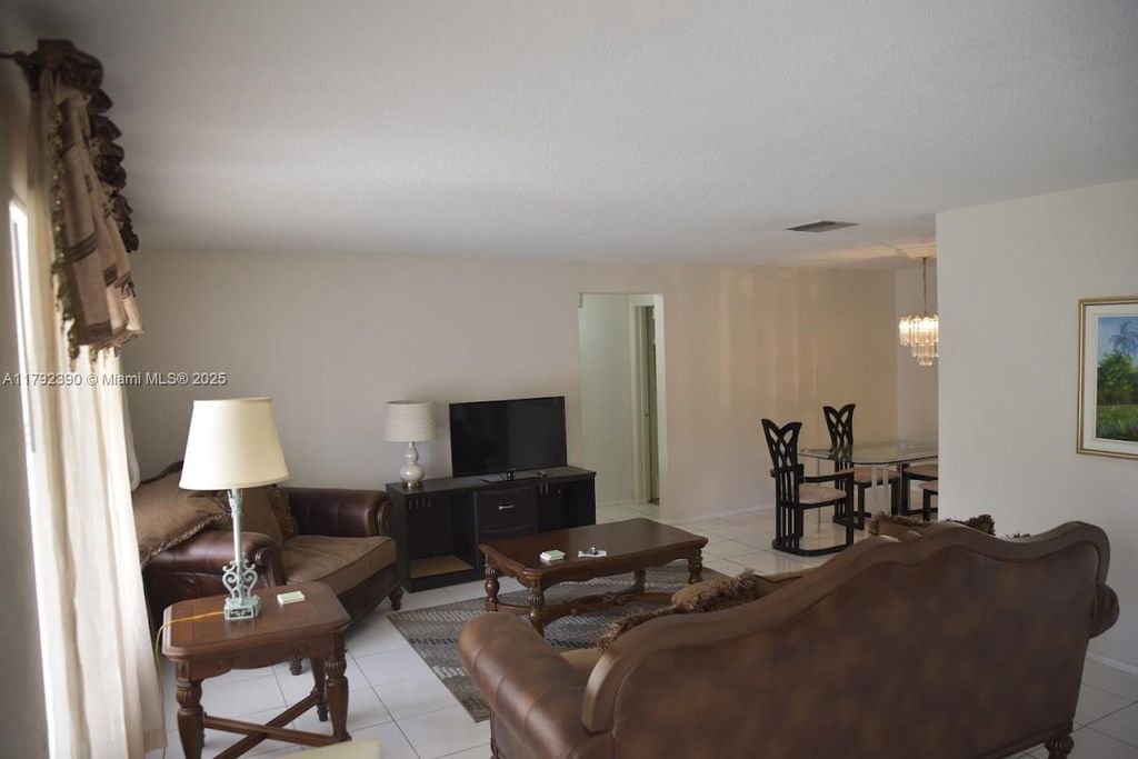 Photo of 4701 NW 43rd Ave, Tamarac, FL 33319 (MLS # A11792390)