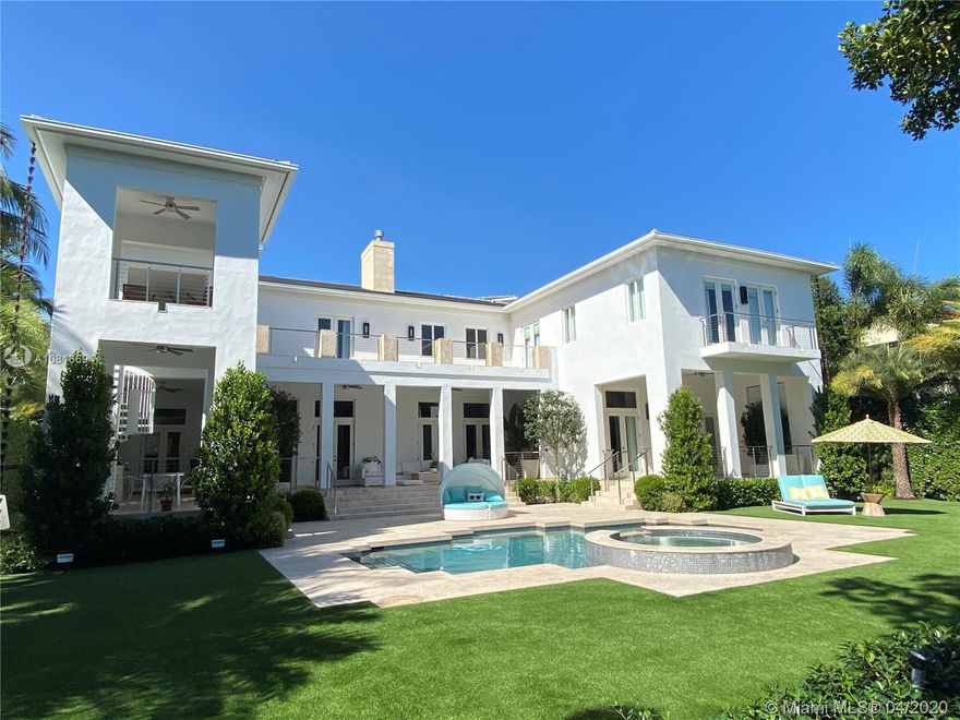 Stunning, Ramon Pacheco designed Modern-Mediterranean waterfront estate, nestled in the heart of Coral Gables, in the highly sought-after gated enclave - the Islands of Cocoplum. The recently renovated home opens to a dramatic foyer with curved marble staircase and high-volume ceilings, amplifying the luminous living and entertaining spaces. European crafted gourmet kitchen blends seamlessly into an expansive family room. Gated smart home includes a 3-car garage, full staff quarters, elevator, media room, 80KW portable generator and more. Resort-style courtyard with heated pool and spa set amidst lush tropical landscape and an expansive terrace with a summer kitchen. Dock your 100ft yacht in your backyard with floating dock, no bridges to bay, deep water access and an extra wide canal!