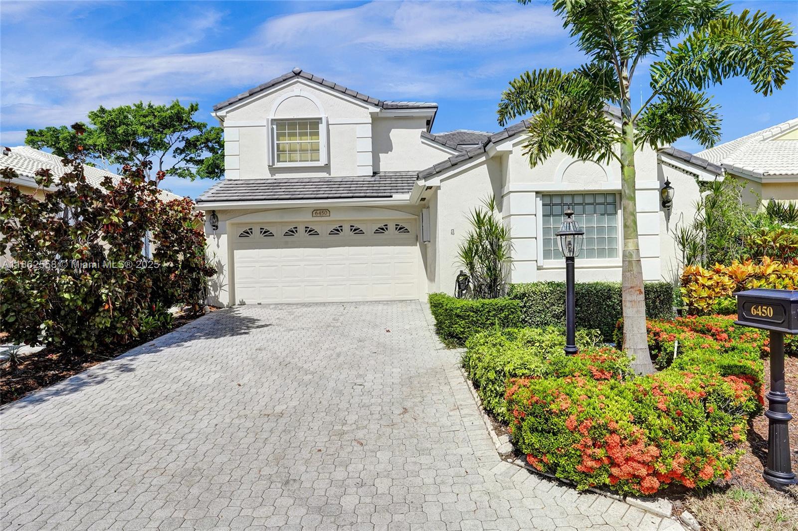 HURRY! NEW ROOF! Discover exceptional value in this updated 2-story home.This light & bright residence offers 3 bedrooms (desirable downstairs primary suite), a flexible built-in office/loft area, impressive volume ceilings with recessed LED lighting, tasteful off-white tile set on the diagonal, luxury vinyl flooring. The open-concept kitchen features 42'' light oak cabinetry, gleaming granite countertops, a marble tile backsplash, and stainless steel appliances, all complemented by a charming breakfast nook. Enjoy the convenience of updated bathrooms and a newer washer & dryer. Accordion hurricane shutters provide storm protection. A additional room adds extra living space, while the private backyard retreat features an inviting screened patio surrounded by lush landscape design .
