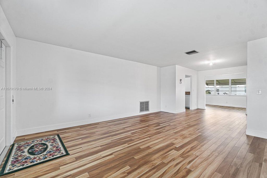 Photo of 2397 SW 11th Ave, Boynton Beach, FL 33426 (MLS # A11679179)