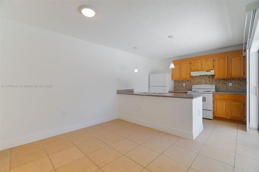This stunning 2-bedroom, 2 1/2-bathroom townhome located in the heart of West Palm Beach  is an oasis of comfort. With an inviting open floor plan, this home offers plenty of space for relaxation and entertainment. The bright and spacious living room boasts large windows that flood the room with natural light, while the dining area is perfect for hosting dinner parties or family gatherings. Come see this beautiful house before its too late.