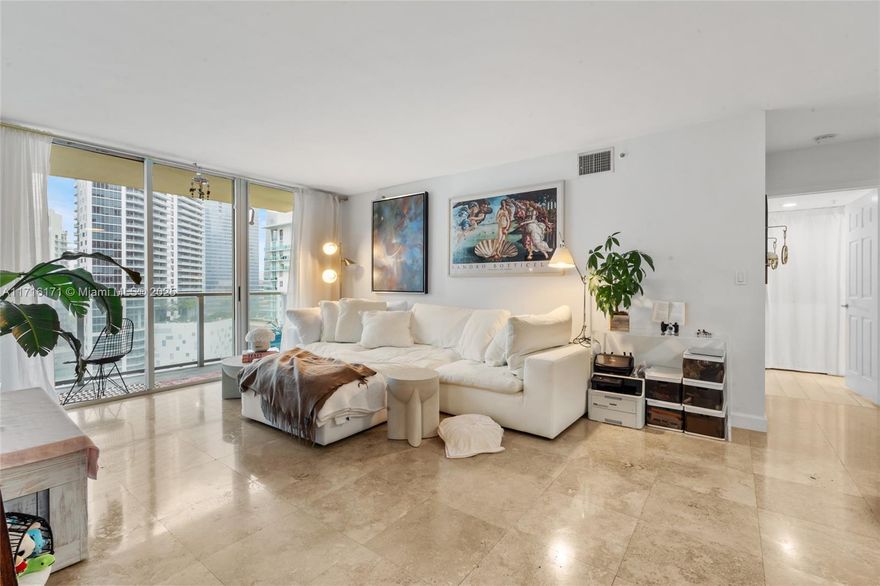 FOR SALE -- Stunning 2-bedroom, 2-bathroom condo in the heart of Brickell at The Mark building offers an elevated lifestyle with views of Biscayne Bay and the city skyline. Located within walking distance of Brickell City Centre, dining, and entertainment, this unit is a rare opportunity for both homeowners and investors, with 12x per year rental allowance. This spacious, naturally lit unit features split bedroom layout, modern tile flooring, a contemporary kitchen with stainless steel appliances and a private balcony perfect for soaking in the scenery. The Mark on Brickell Bay sets the standard for Brickell with top-notch amenities, including a pool deck overlooking the bay, hot tub, tennis / pickleball, racquetball courts, gym, sauna, billiards room, convenience store, and more.