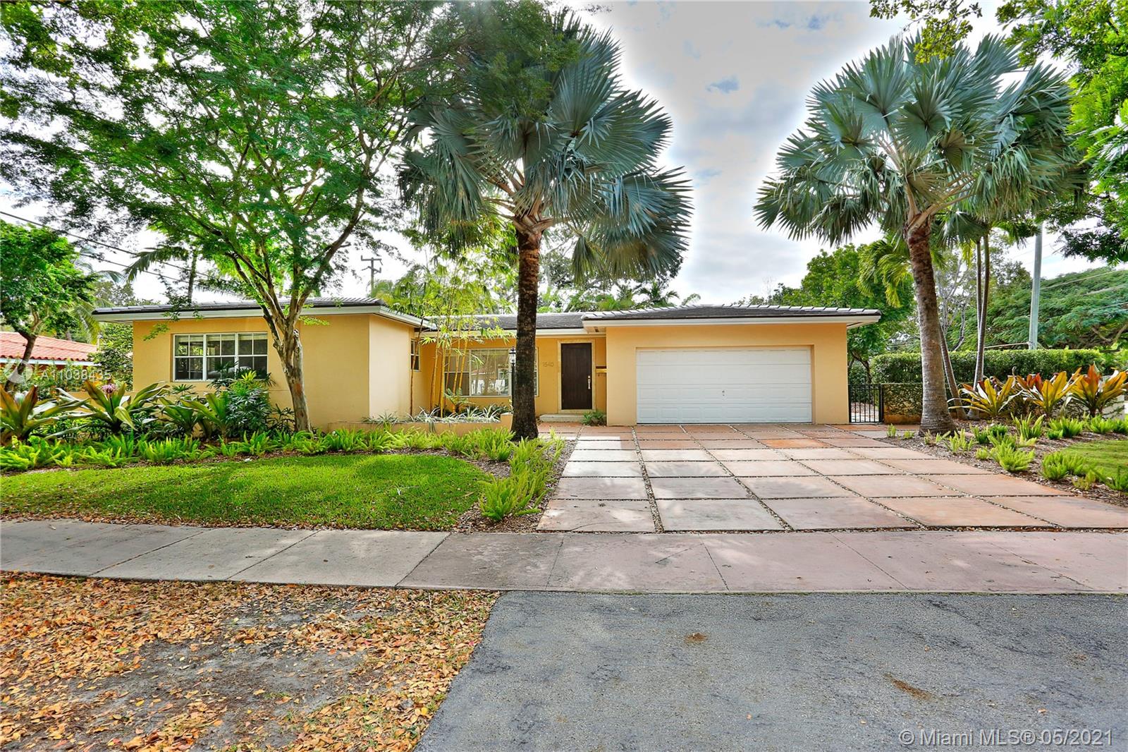 This 3 bedroom, 2 bathroom home has been beautifully updated, wonderfully maintained, and is ready for its new tenants! Located in the heart of Coral Gables it measures 1,969 adjusted square feet and sits on an oversized 11,025 square foot lot with a beautiful pool surrounded by lush landscaping. The open floorplan lends itself easily to today’s lifestyle, as does the gorgeously remodeled kitchen with granite counters and stainless steel appliances. The home features marble and hardwood floors, renovated bathrooms, large 2 car garage, brand new roof, easy access to downtown Coral Gables and South Miami, and it is located in the David Fairchild school district. Move right in to this clean, pristine, and updated rental!