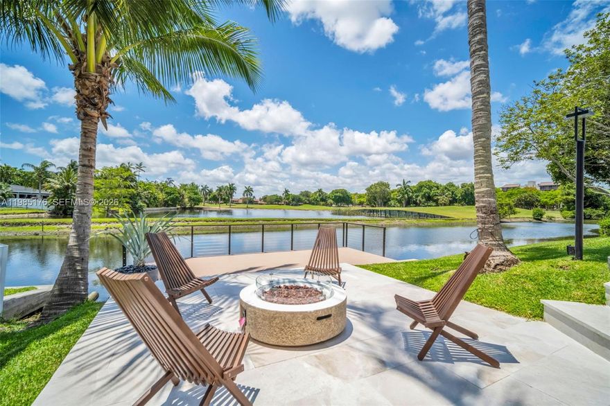 One of the most unique homes in Emerald Hills, offering the rare combination of ocean access, panoramic lake, canal, and golf course views, and a level of finish seldom seen in the neighborhood.

Designed for both daily living & entertaining, the home features open living spaces, walls of glass, & a resort-style backyard overlooking the water and greens. The chef’s kitchen is equipped with natural gas, a professional-grade cooktop, & a custom high-heat pizza oven.

A fully integrated smart home system provides seamless control of lighting, climate, security, & audio. A comprehensive security system offers peace of mind, while hidden in-wall and in-ceiling speakers deliver whole-home sound without visible equipment.

Additional highlights include a spa-like primary suite, custom closets, full-home generator, natural gas infrastructure, impact windows and doors, & a functional layout balancing openness with defined spaces.

The backyard offers a private retreat with a 12 person spa, pool, multiple lounge & dining areas, & a fully equipped outdoor kitchen designed for elevated entertaining — perfect for hosting & searing steaks while enjoying views of the water & golf course. Direct water access allows for paddle boarding & jet skiing from your own backyard.

Ideally located near houses of worship, major roadways, shopping, dining, Beaches & FLL, this is a truly unique opportunity in Emerald Hills.