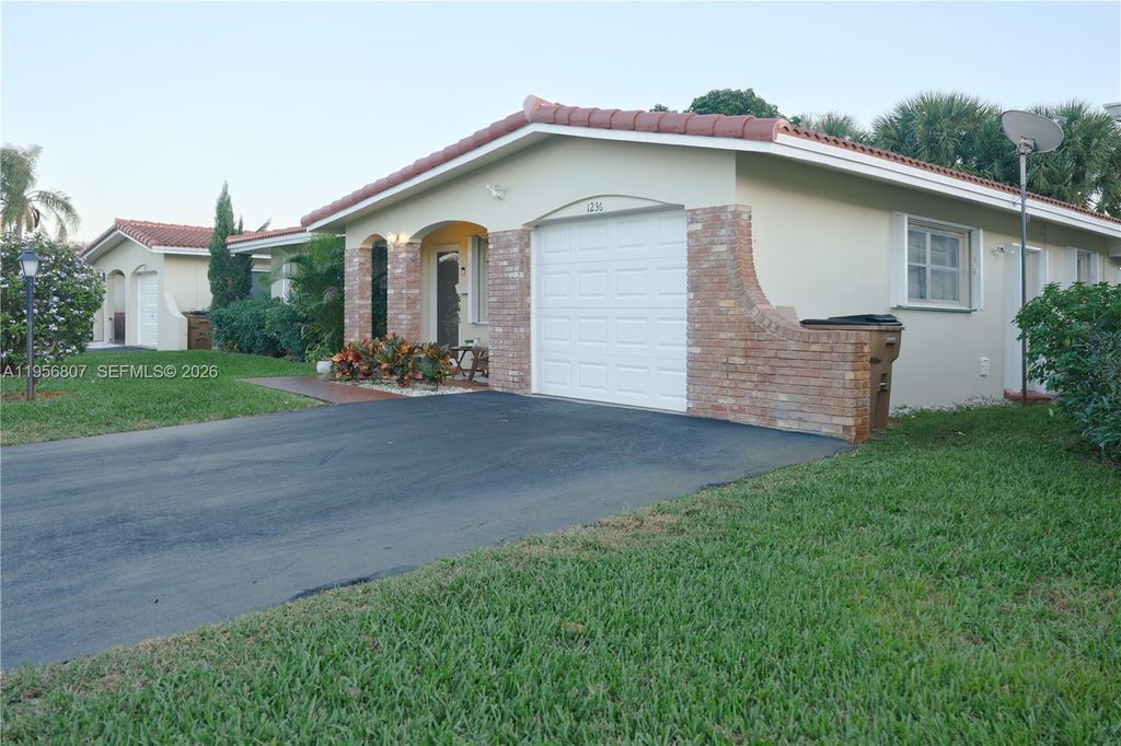 Photo of 1236 NW 43rd St, Deerfield Beach, FL 33064 (MLS # A11956807)