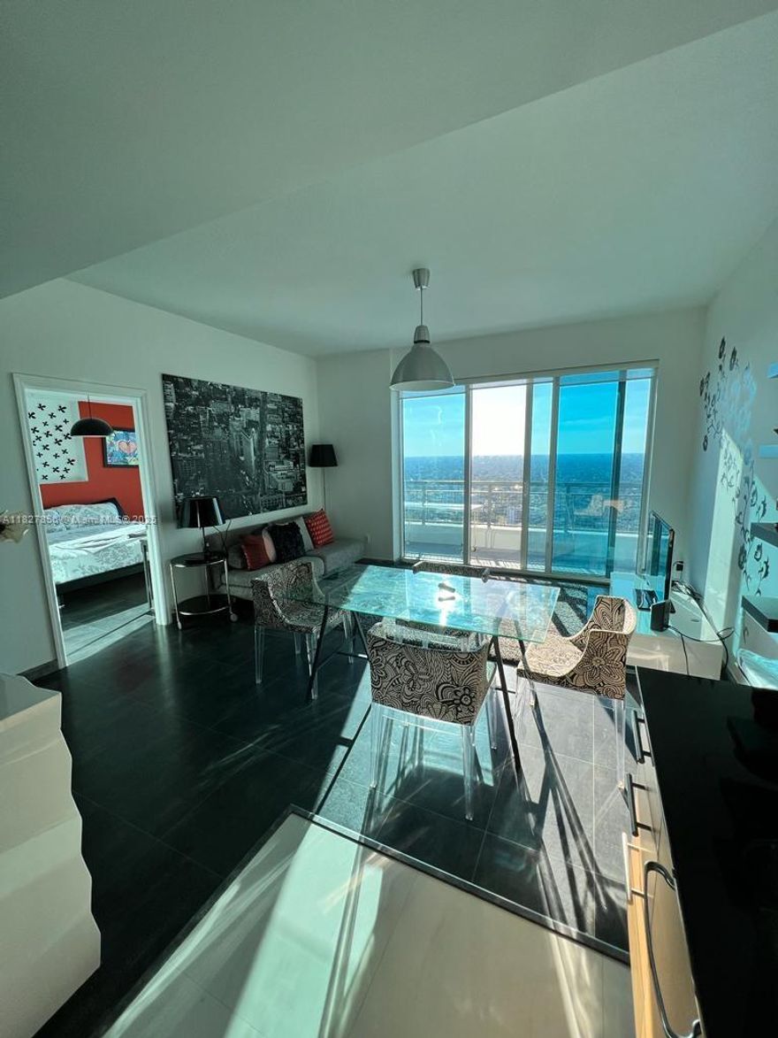 This one-bedroom residence, ideally located in the heart of Brickell, offers a rare opportunity to own a home with breathtaking views of both the ocean and Miami’s iconic skyline. Situated on a high floor, the residence provides an inspiring backdrop to everyday living. Offered unfurnished—with the option to be fully furnished—it gives you the flexibility to personalize or move in with ease. Just steps away from world-class dining, shopping, business hubs, and public transportation, this property places the very best of Brickell and the oceanfront lifestyle right at your doorstep.