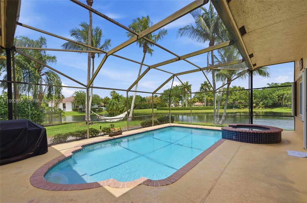 Photo of 3038 Lakewood Dr, Weston, FL 33332 (MLS # A11992656)