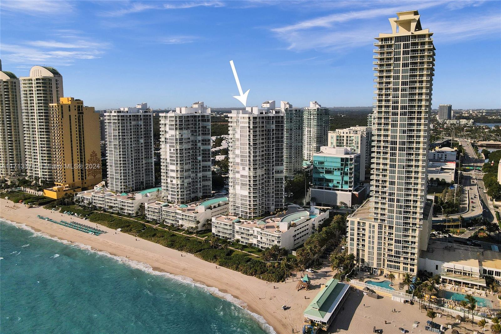 Wake Up to Oceanfront Bliss Experience coastal living in this large 2BR/2BA corner condo w/ tons of natural light & panoramic ocean & skyline views. Start your mornings w/ the sound of waves & a gorgeous sunrise from your private retreat. This unit features an updated eat-in galley kitchen, modern baths, & a spacious primary BR designed for relaxation. Enjoy premier amenities: spa, state-of-the-art gym, tennis courts, full beach service, 24-hr security, & concierge. Convenience abounds w/ 1 covered parking space, extra storage, & a prime location near Bal Harbour Shops & Aventura Mall. Every day feels like a vacation—don’t miss this exceptional lifestyle!