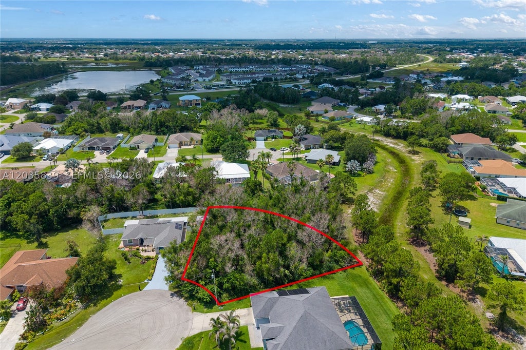 Photo of 5501 Chapel Ct, Port St Lucie, FL 34986 (MLS # A12035839)
