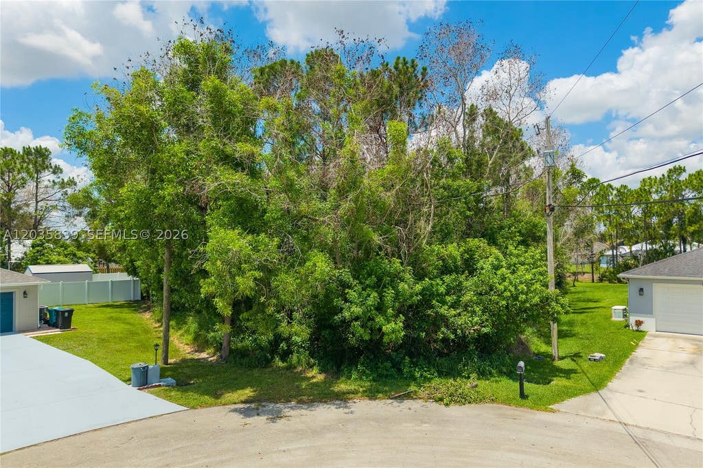 Photo of 5501 Chapel Ct, Port St Lucie, FL 34986 (MLS # A12035839)