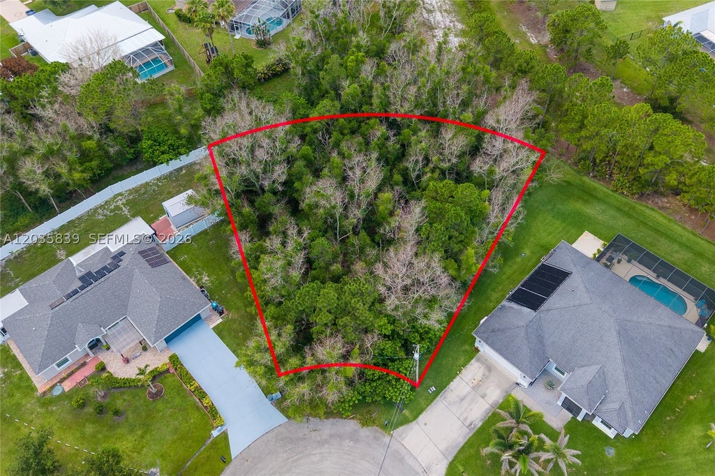 Photo of 5501 Chapel Ct, Port St Lucie, FL 34986 (MLS # A12035839)