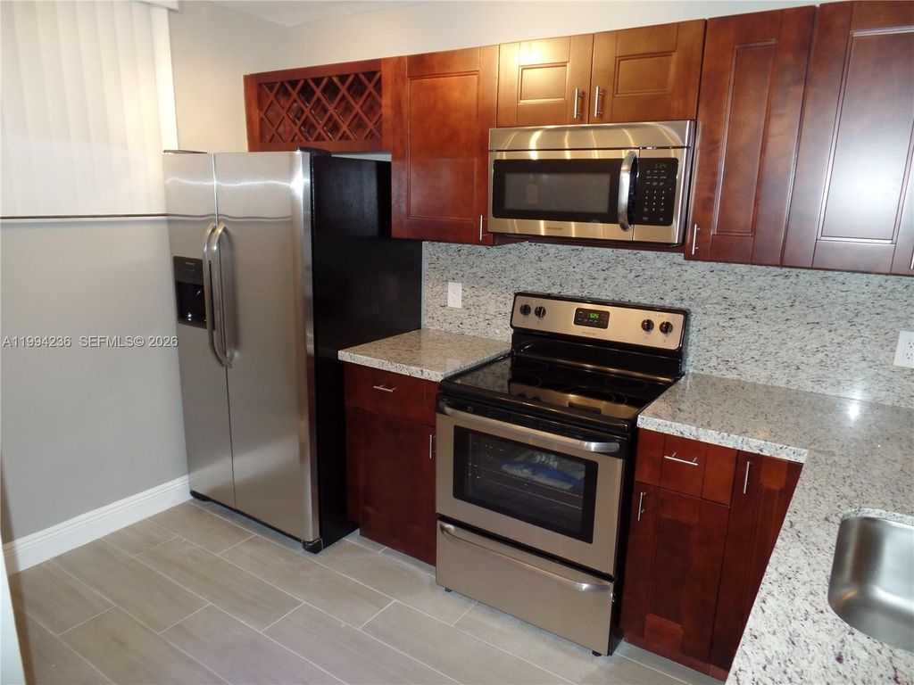 Photo of 109 Lake Emerald Dr #108, Oakland Park, FL 33309 (MLS # A11994236)