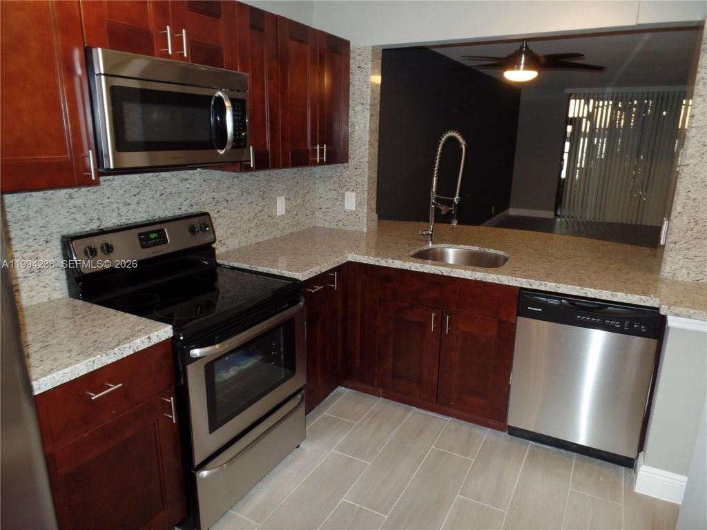 Photo of 109 Lake Emerald Dr #108, Oakland Park, FL 33309 (MLS # A11994236)