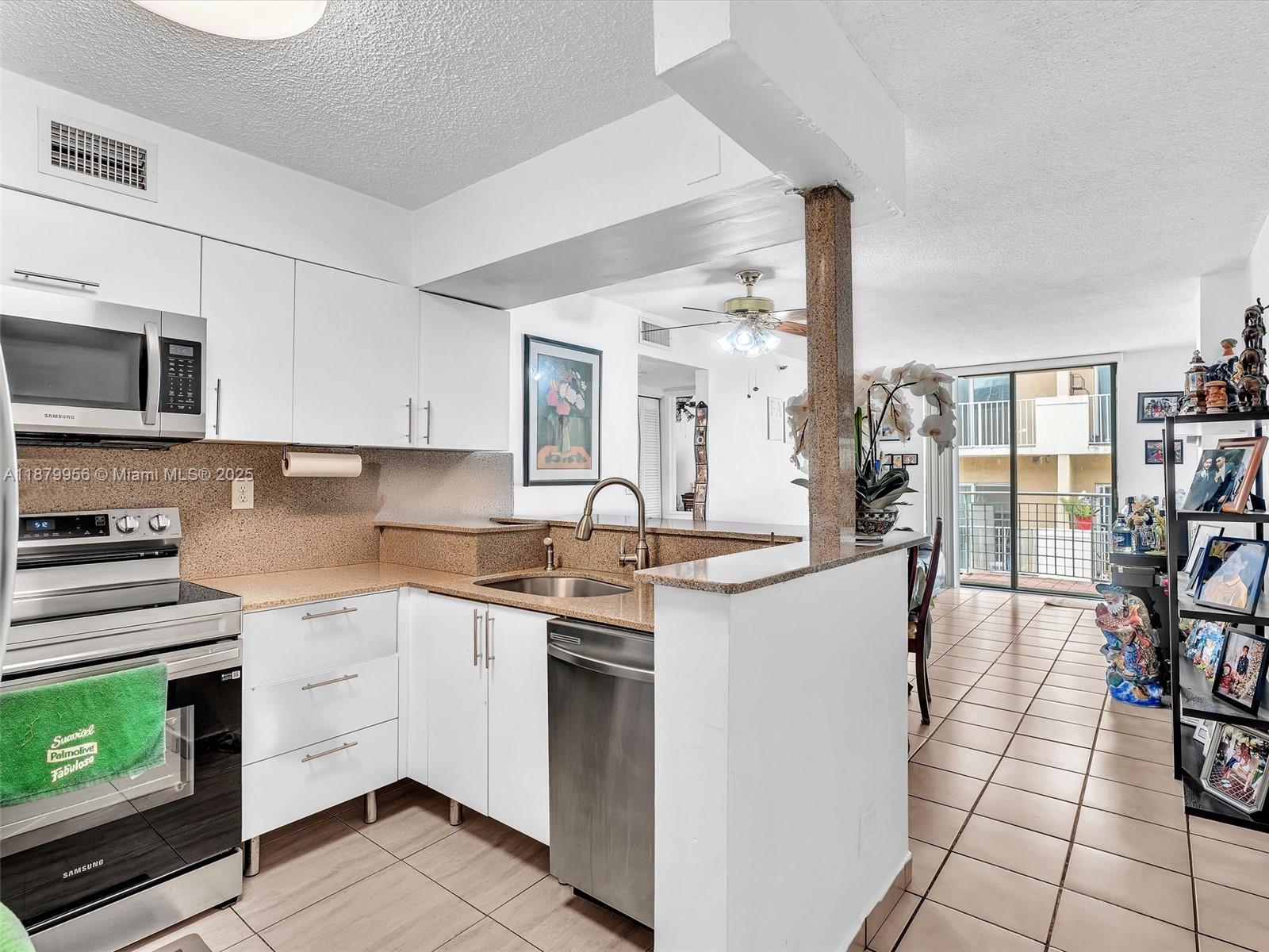 Stylish 2-bedroom, 1-bathroom corner unit located just minutes from Brickell, Miami Beach, and the Design District. This bright and airy condo features tile floors throughout, stainless steel appliances, an open living space, and a private balcony. The corner location offers extra windows and natural light, creating a warm and inviting atmosphere. Enjoy the convenience of a secured and covered parking garage. Easy access to public transportation, making commuting a breeze. Only two blocks away from the award winning Ada Merritt K-8 Center School. Perfectly situated near plenty of shops, nightlife, and top restaurants such as Casa Neos, Garcia's, and Kiki's. This condo offers the ideal blend of comfort and city living. Don’t miss the chance to own a prime piece of Miami real estate!