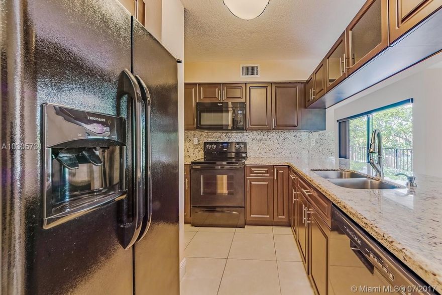 LOCATION, LOCATION!!! MINUTES TO MAIN STREET!! HURRY SOUGHT AFTER EAGLE NEST CONDO COMPLEX RARELY AVAILABLE!! LOCATED IN THE MIDDLE OF RESIDENTIAL AREA SURROUNDED BY BEAUTIFUL HOMES & LUSH LANDSCAPTING.  THIS GORGEOUS BRIGHT REMODELED UNIT WAS RENOVATED ABOUT 2 YRS AGO, KNOCKDOWN CEILINGS, 16" NEUTRAL TILES THROUGHOUT, GRANITE KITCHEN COUNTERTOPS, RENOVATED KITHCEN CABINETS W/ADDT'L PANTRY CLOSET, NEWER APPLIANCES, NEWER WATER HEATER, BATHROOMS WERE ALSO RENOVATED, FORMAL DINING ROOM AREA, SNACK COUNTER, NEWER LIGHT FIXTURES, SPACIOUS LIVING ROOM AND LARGE BEDROOMS, LARGE OPEN BALCONY, WINDOWS W/ACCORDIAN SHUTTERS, 12X6 MASTER CLOSET & MORE. MAKE THIS ONE A MUST SEE!!