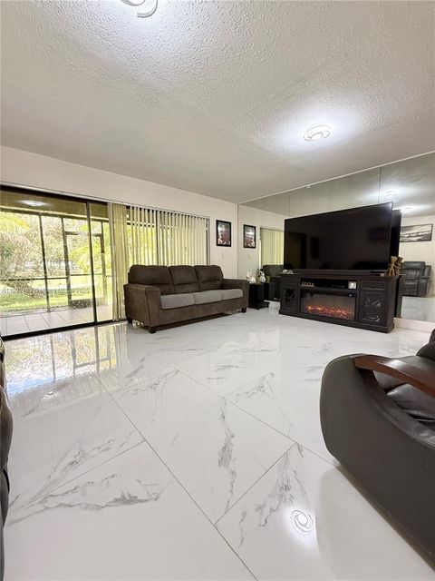 Photo of 3536 Estepona Ave #21S2, Doral, FL 33178 (MLS # A11892400)