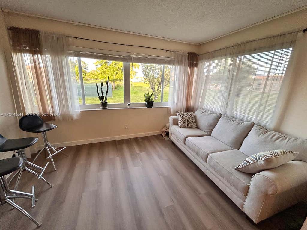Photo of 9801 Sunrise Lakes Blvd #208, Sunrise, FL 33322 (MLS # A12006841)