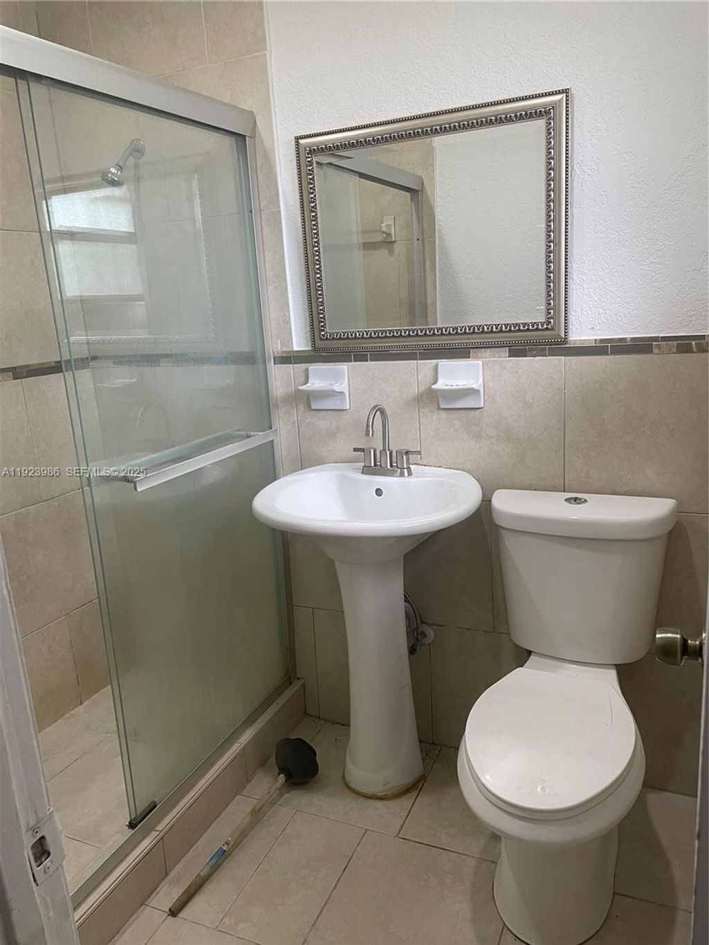 Photo of 2481 NW 13th Ct #1-2, Fort Lauderdale, FL 33311 (MLS # A11923986)