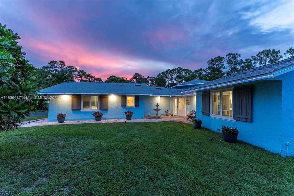 Photo of 10709 N 159th Ct N, Jupiter, FL 33478 (MLS # A11836087)