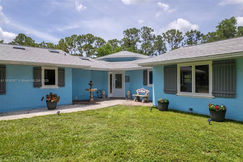 Photo of 10709 N 159th Ct N, Jupiter, FL 33478 (MLS # A11836087)