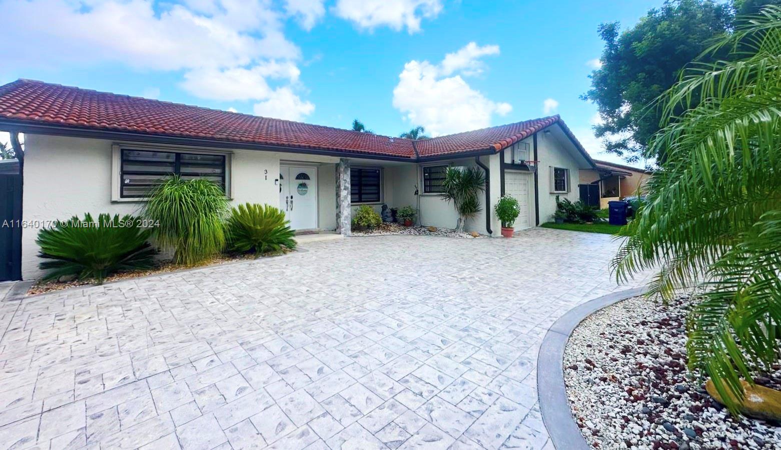 Spacious and move-in ready home with a renovated pool and new pool system, perfect for relaxation and entertainment. This home boasts 5 bedrooms and 3 bathrooms + an in-law suite with kitchenette with an independent exterior entrance and indoor access, new A/C (as per seller 1 y/o), water softener system, tankless water heater, stainless steel appliances including electric stove with a self cleaning oven, microwave, and Quartz countertops. The French doors located in the family room lead to a captivating tiled and covered terrace with recessed lighting and electric ceiling fan, making this area your own private retreat. Located in a highly-sought neighborhood, close to top-rated schools, shopping centers, and express-ways. *** A MUST SEE!! ***