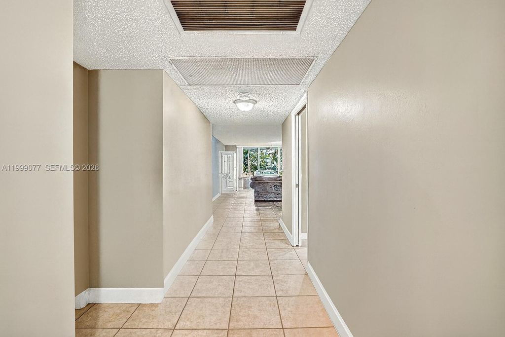 Photo of 823 Cypress Blvd #104, Pompano Beach, FL 33069 (MLS # A11999077)