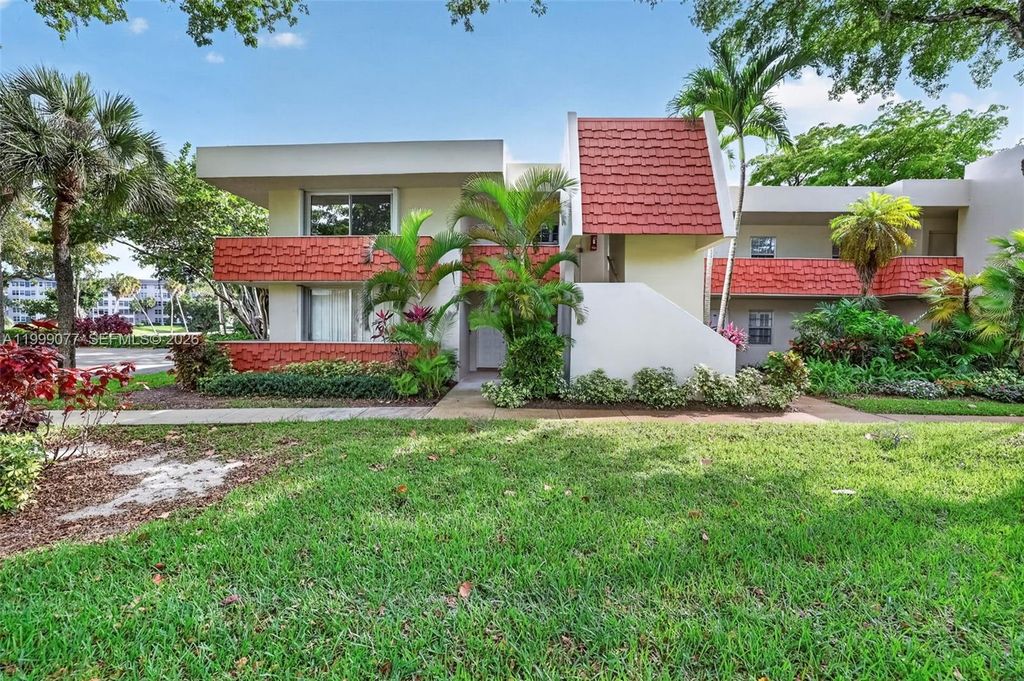 Photo of 823 Cypress Blvd #104, Pompano Beach, FL 33069 (MLS # A11999077)